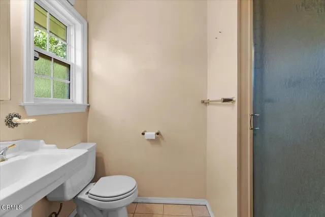 a bathroom with a sink and a toilet