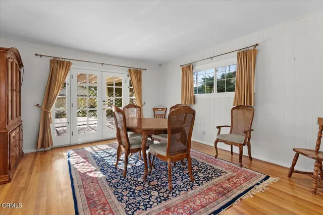 a workspace with furniture and a rug