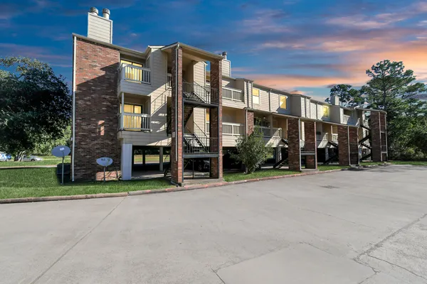 a view of a building with a street