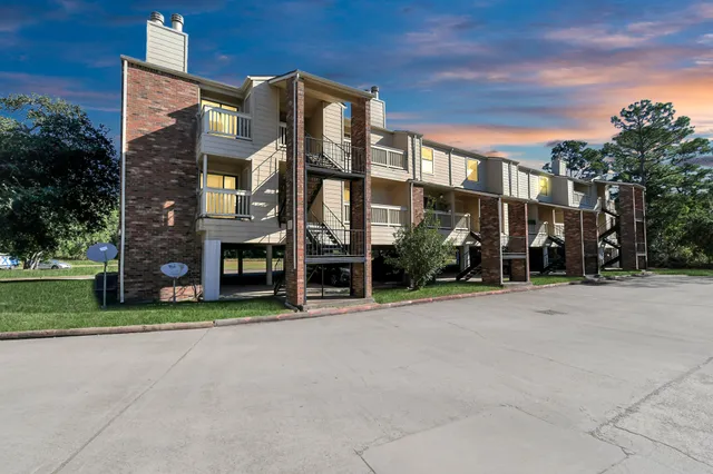 a view of a building with a street