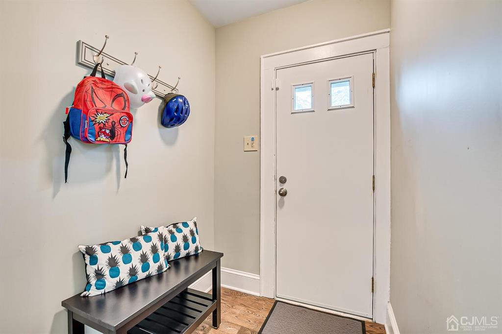 79 Van Ness Terrace Maplewood, NJ 07040 - Photo 21 of 40 a living room with furniture and a couch