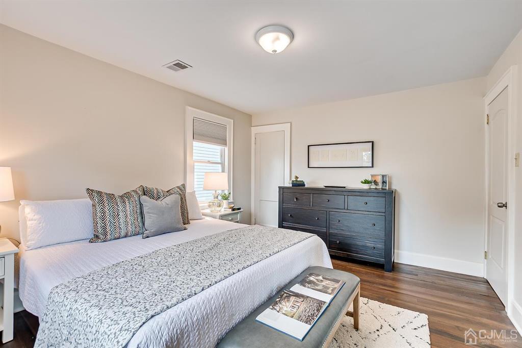 79 Van Ness Terrace Maplewood, NJ 07040 - Photo 25 of 40 a bedroom with a bed and a dresser
