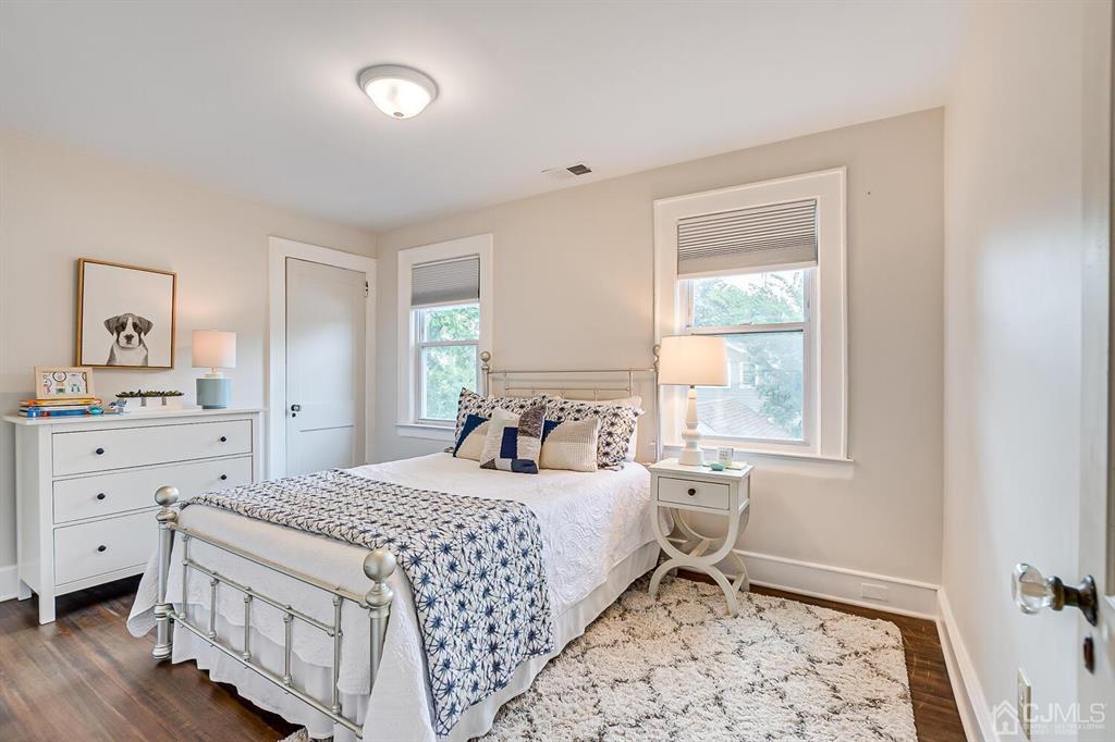 79 Van Ness Terrace Maplewood, NJ 07040 - Photo 27 of 40 a bedroom with a bed and a window