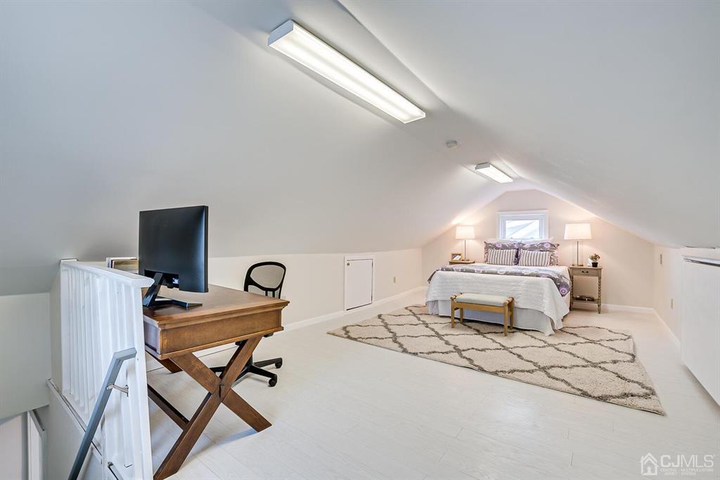 79 Van Ness Terrace Maplewood, NJ 07040 - Photo 30 of 40 a bedroom with a bed and a desk