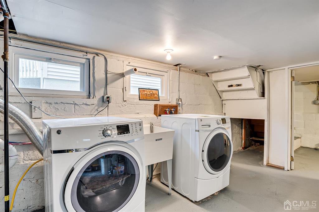 79 Van Ness Terrace Maplewood, NJ 07040 - Photo 36 of 40 a utility room with dryer and washer