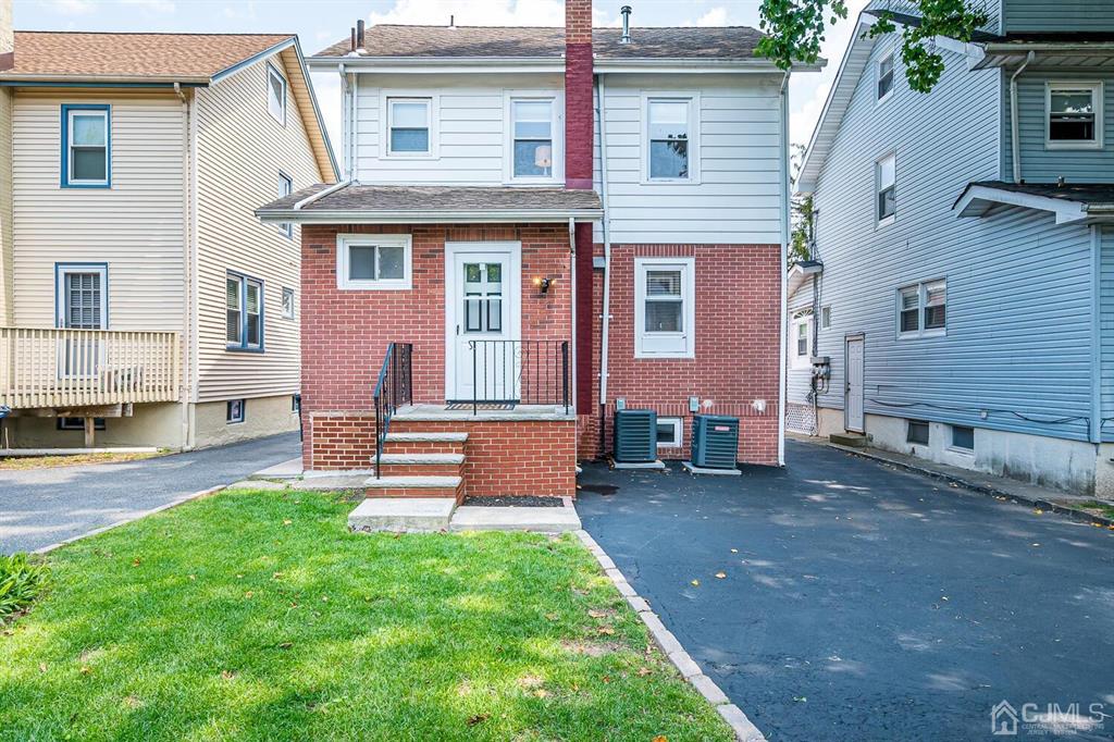 79 Van Ness Terrace Maplewood, NJ 07040 - Photo 39 of 40 a front view of a house with a yard