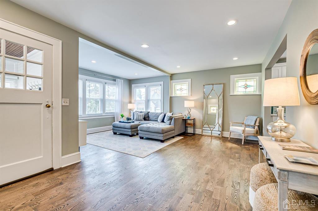 79 Van Ness Terrace Maplewood, NJ 07040 - Photo 6 of 40 a living room with furniture and a couch