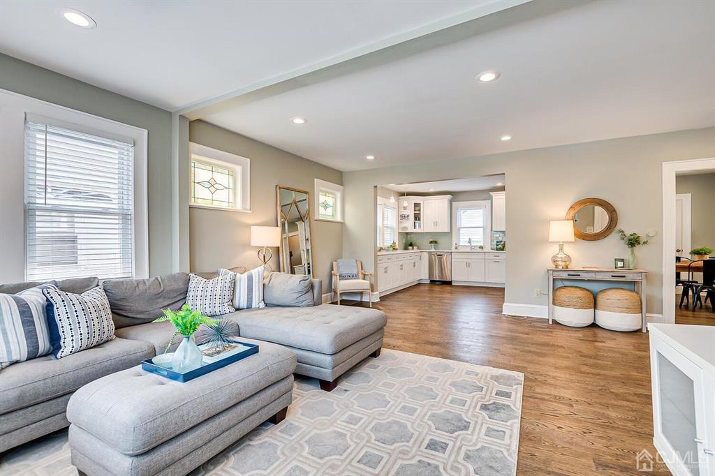 79 Van Ness Terrace Maplewood, NJ 07040 - Photo 10 of 40 a living room with furniture and a wooden floor