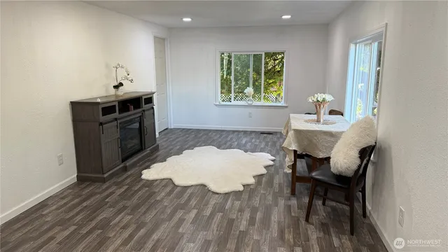 a workspace with furniture and window