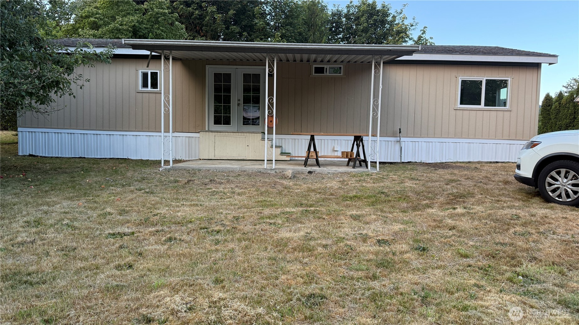 11517 155th Avenue Southeast Renton, WA 98059 - Photo 15 of 17 a view of a house with a backyard