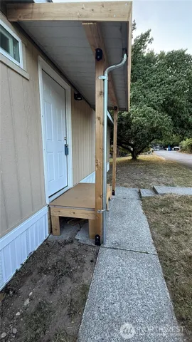 a house view with a backyard space