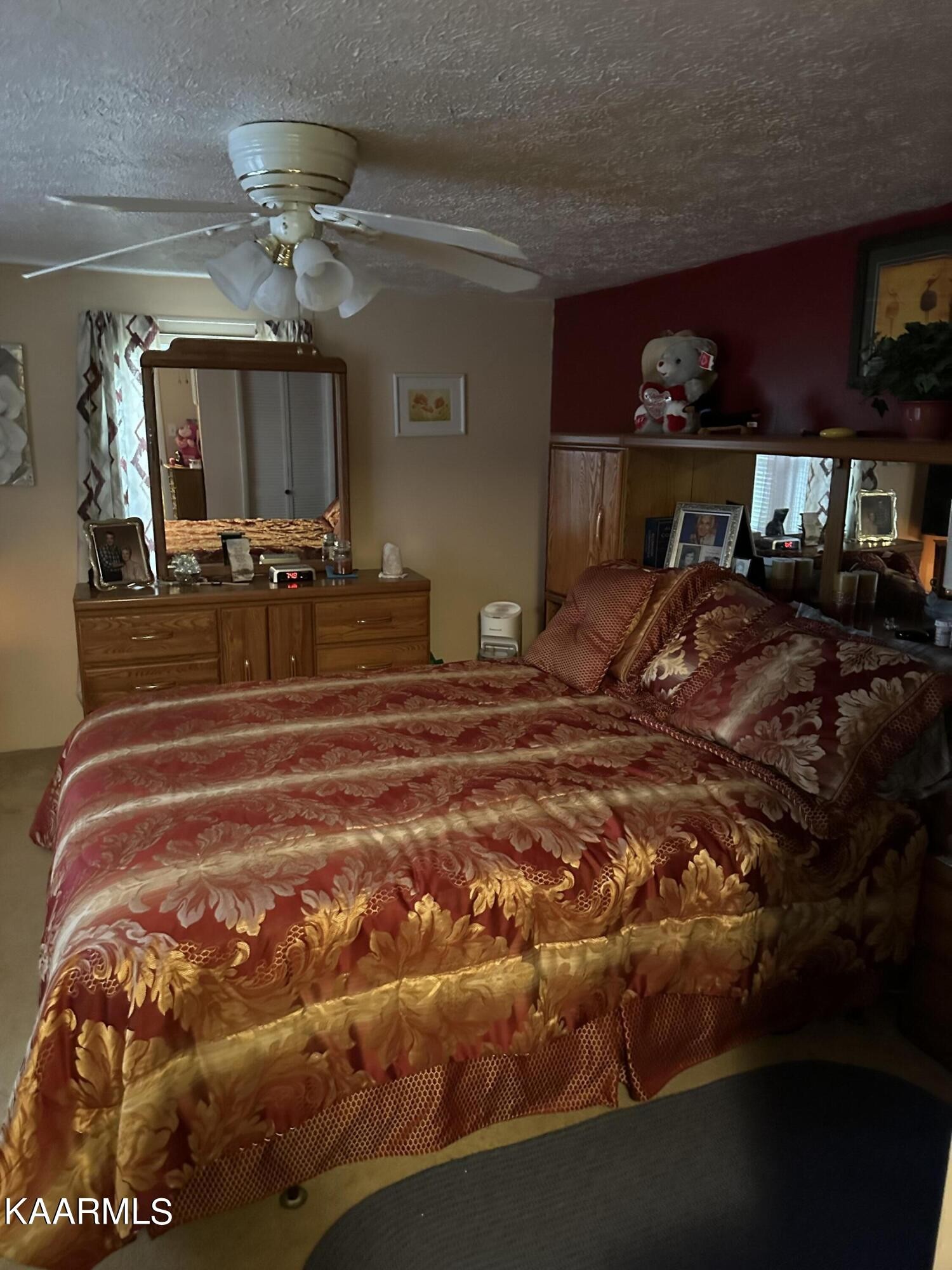 2512 Kennedy Road Knoxville, TN 37914 - Photo 6 of 10 a bedroom with a bed and a chandelier