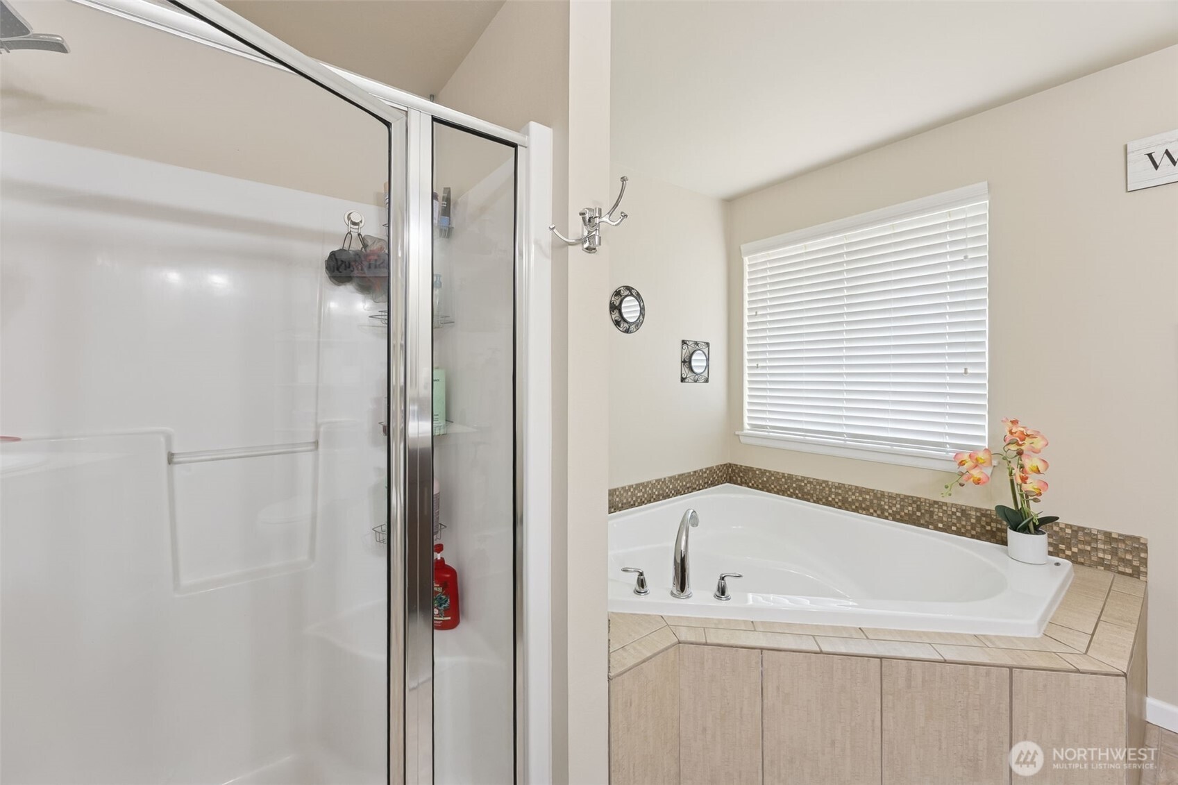 103 Balmer Street Southwest Orting, WA 98360 - Photo 19 of 30 a bathroom with a bathtub and a shower