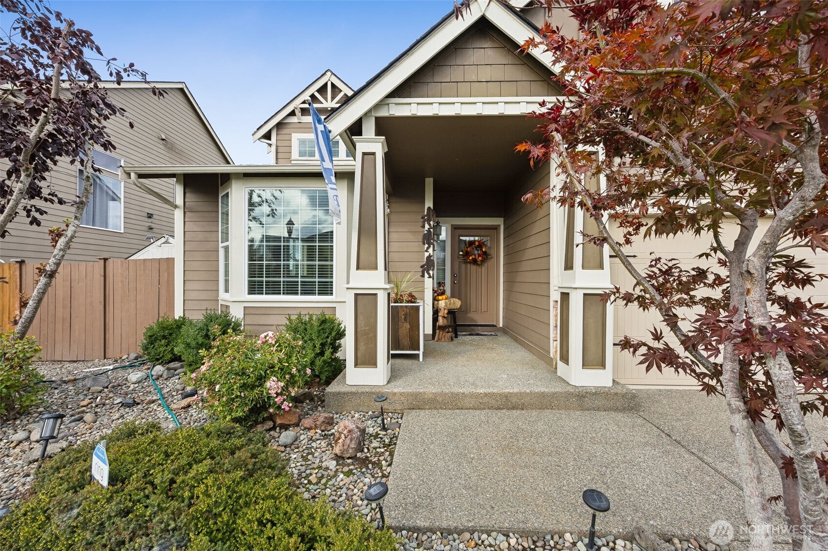 103 Balmer Street Southwest Orting, WA 98360 - Photo 2 of 30 a view of a house with a porch