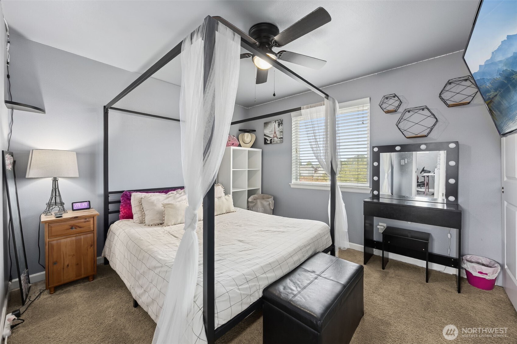 103 Balmer Street Southwest Orting, WA 98360 - Photo 21 of 30 a bedroom with a bed a desk and chair