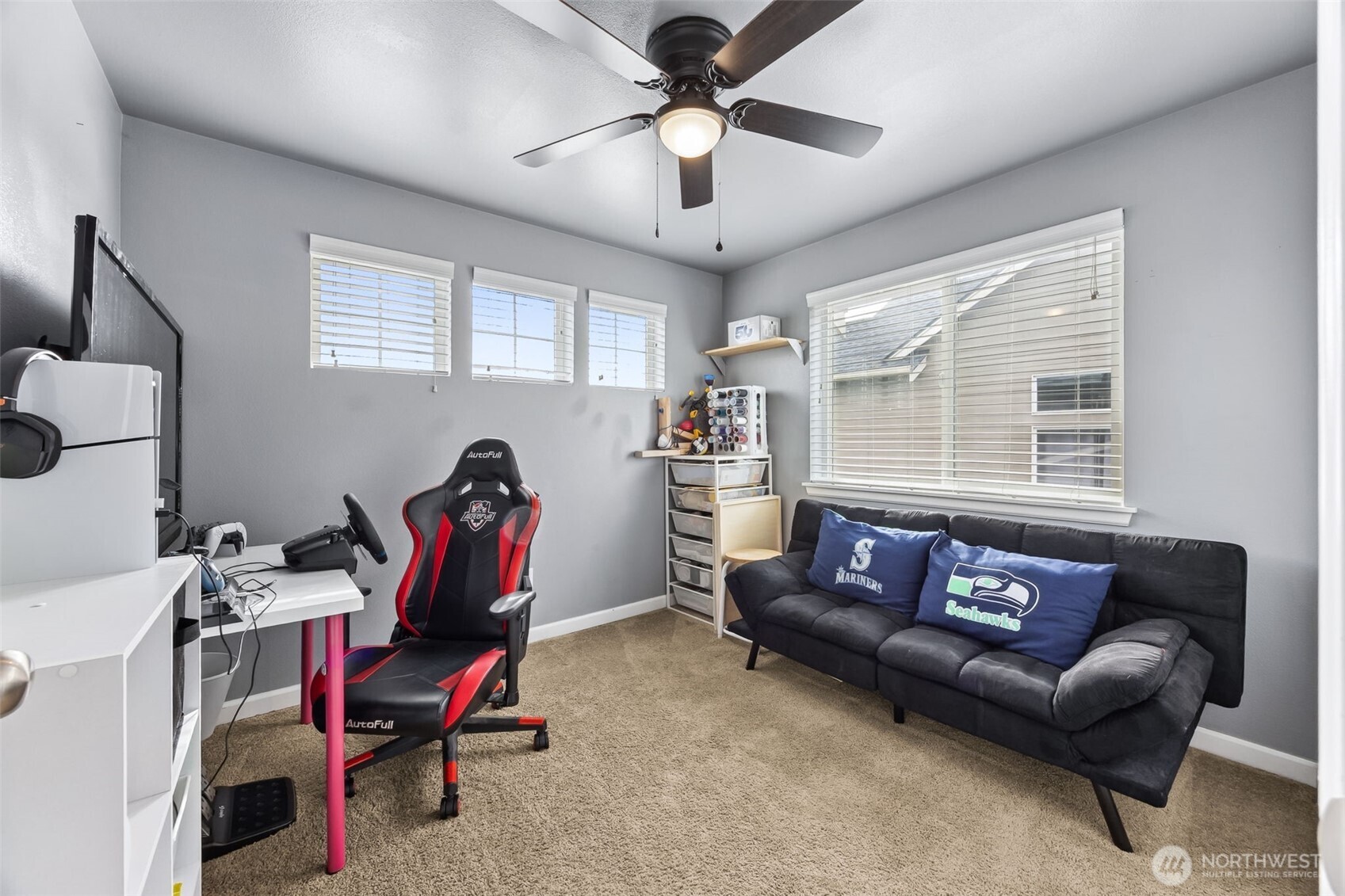 103 Balmer Street Southwest Orting, WA 98360 - Photo 22 of 30 a living room with furniture and a window