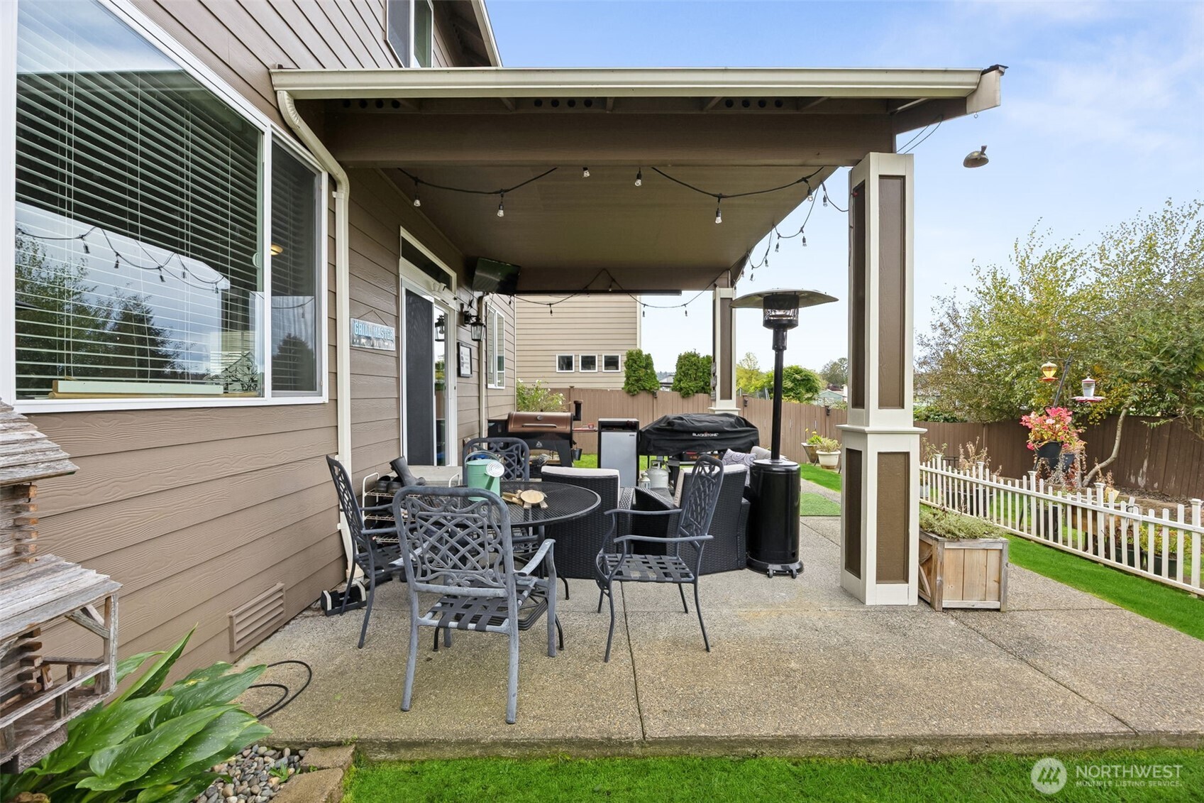 103 Balmer Street Southwest Orting, WA 98360 - Photo 25 of 30 a patio with table and chairs