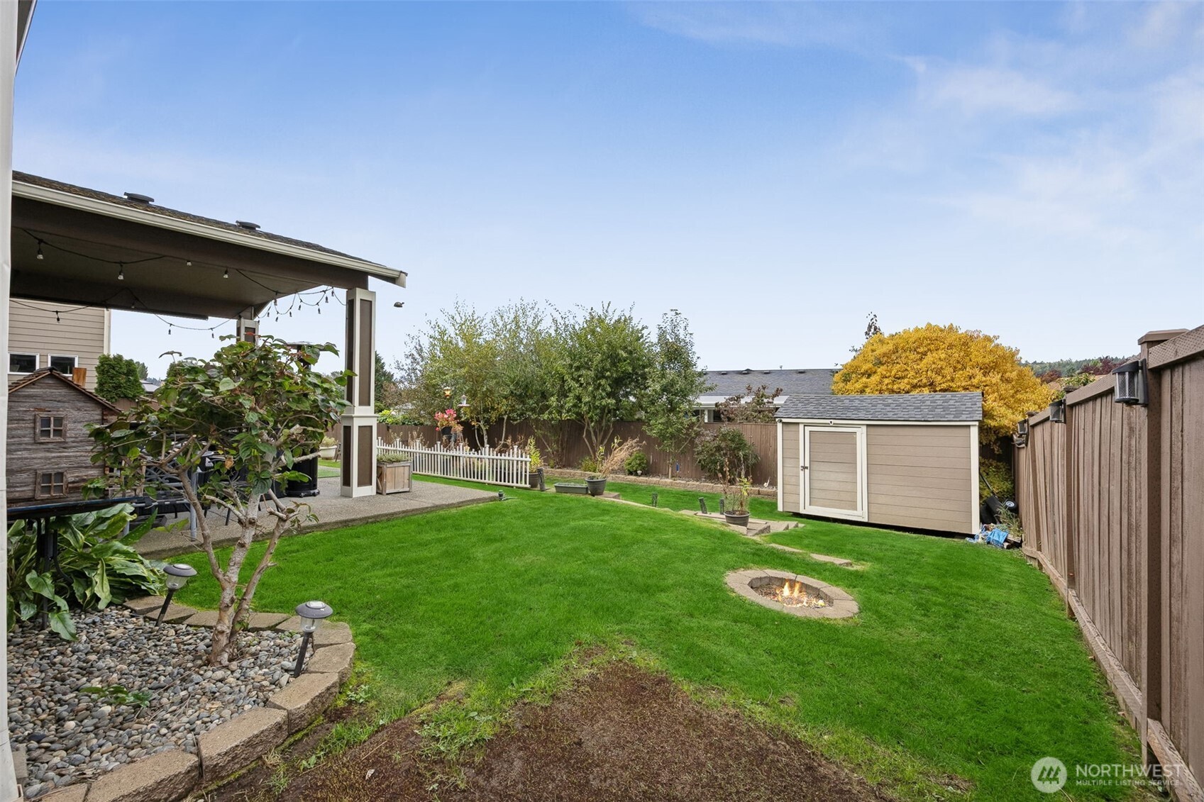 103 Balmer Street Southwest Orting, WA 98360 - Photo 26 of 30 a house view with a garden space
