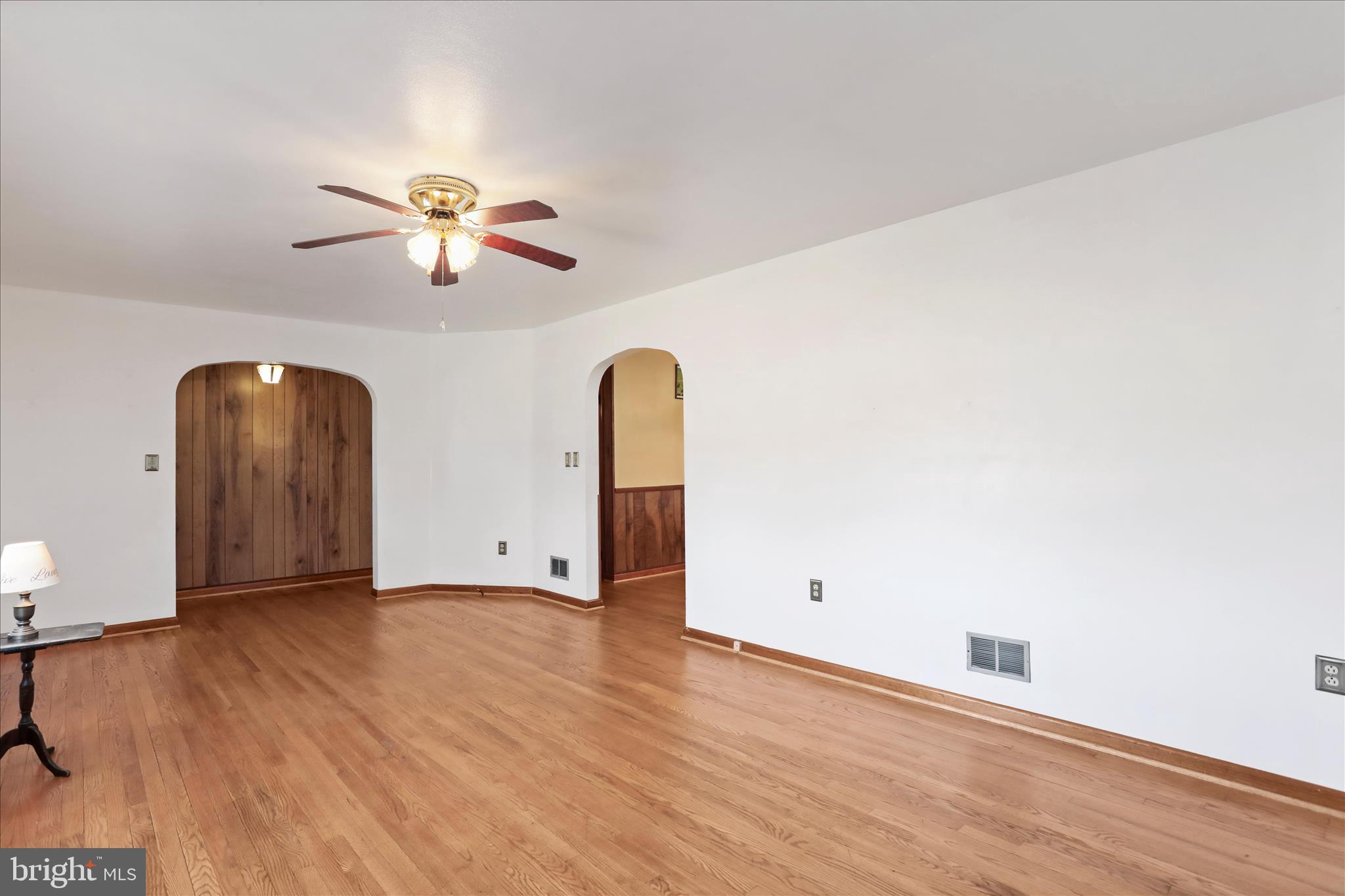 550 Bucks Mill Road Strasburg, VA 22657 - Photo 15 of 57 a view of an empty room with window and wooden floor