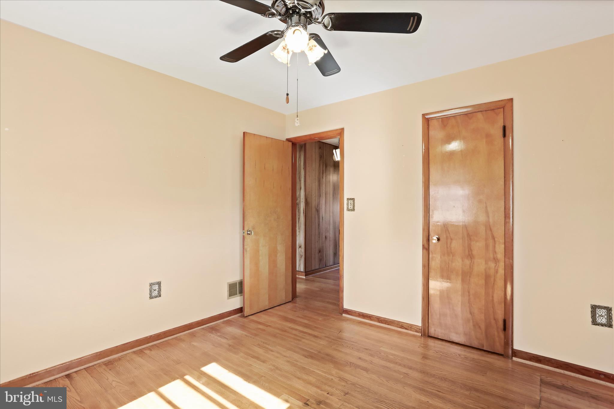550 Bucks Mill Road Strasburg, VA 22657 - Photo 21 of 57 a view of an empty room with wooden floor