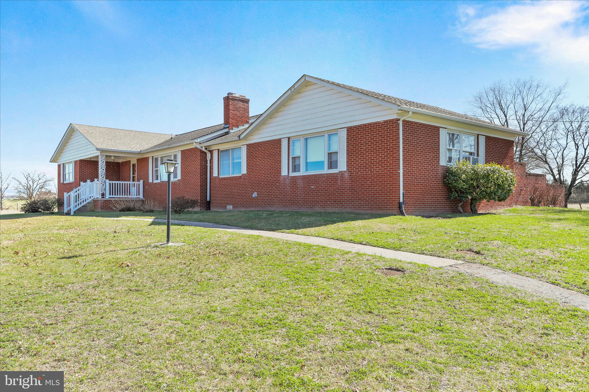 550 Bucks Mill Road Strasburg, VA 22657 - Photo 38 of 57 a front view of a house with a yard and garage