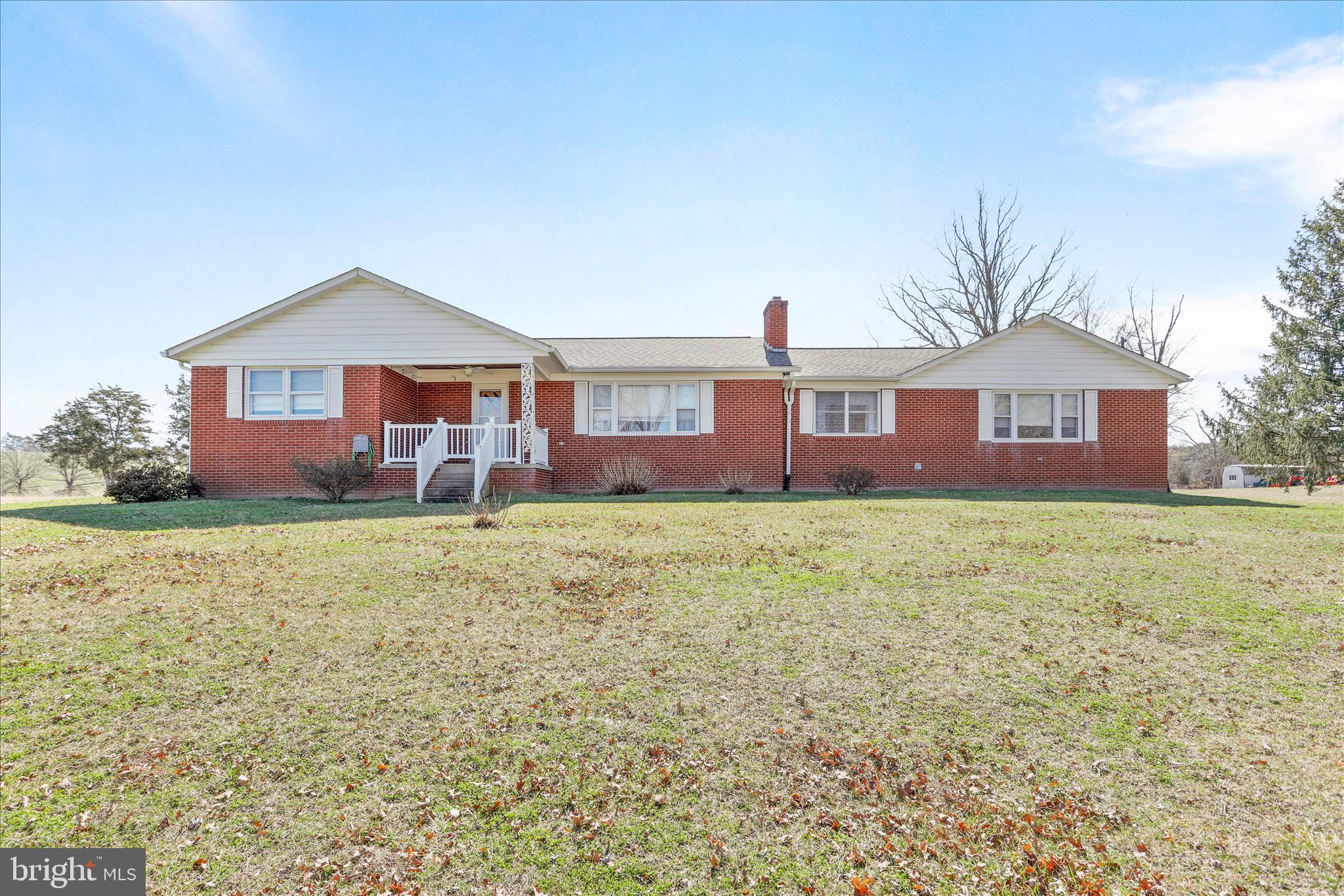 550 Bucks Mill Road Strasburg, VA 22657 - Photo 44 of 57 a front view of a house with garden