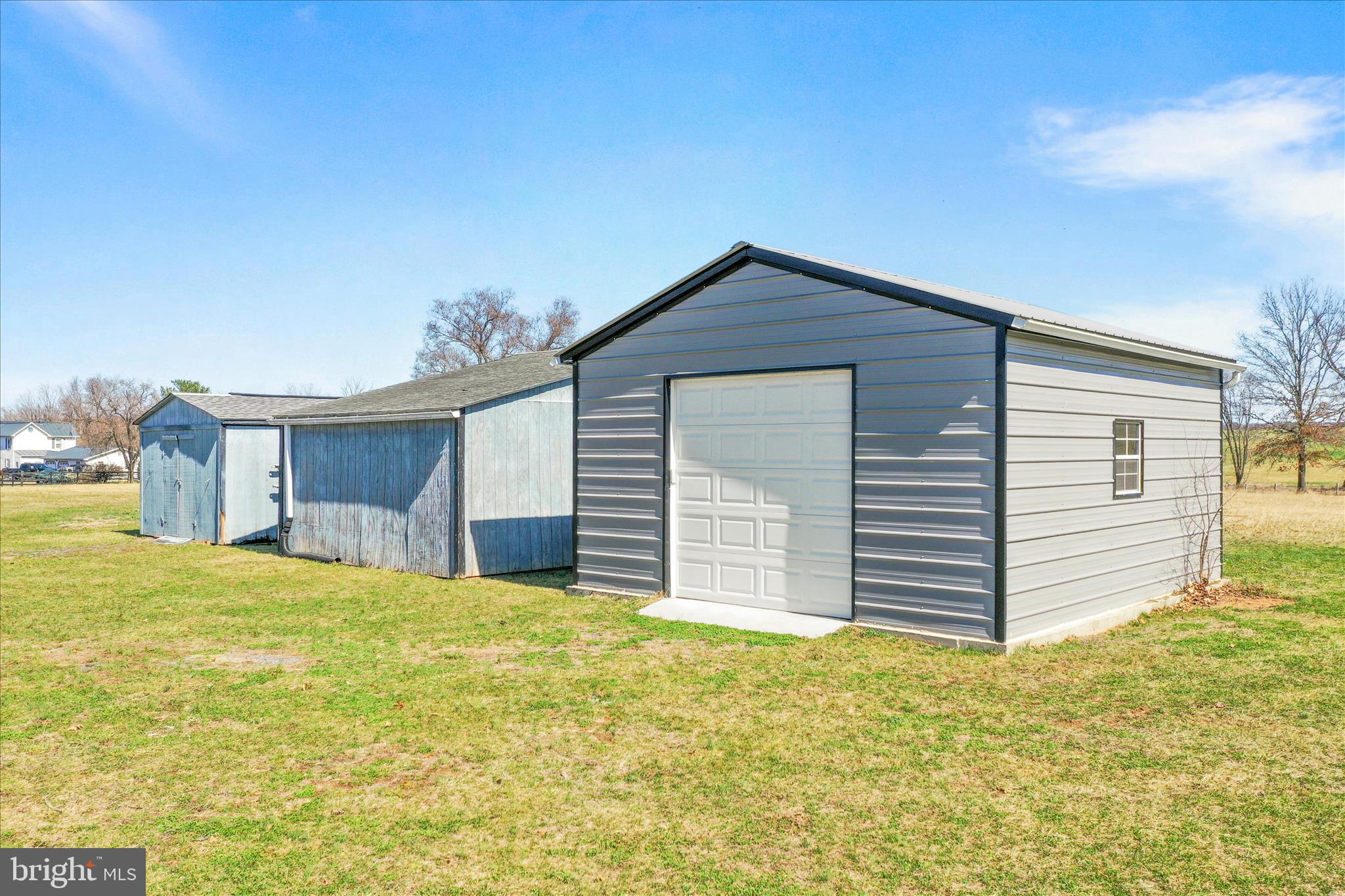 550 Bucks Mill Road Strasburg, VA 22657 - Photo 56 of 57 a view of a house with yard and garage