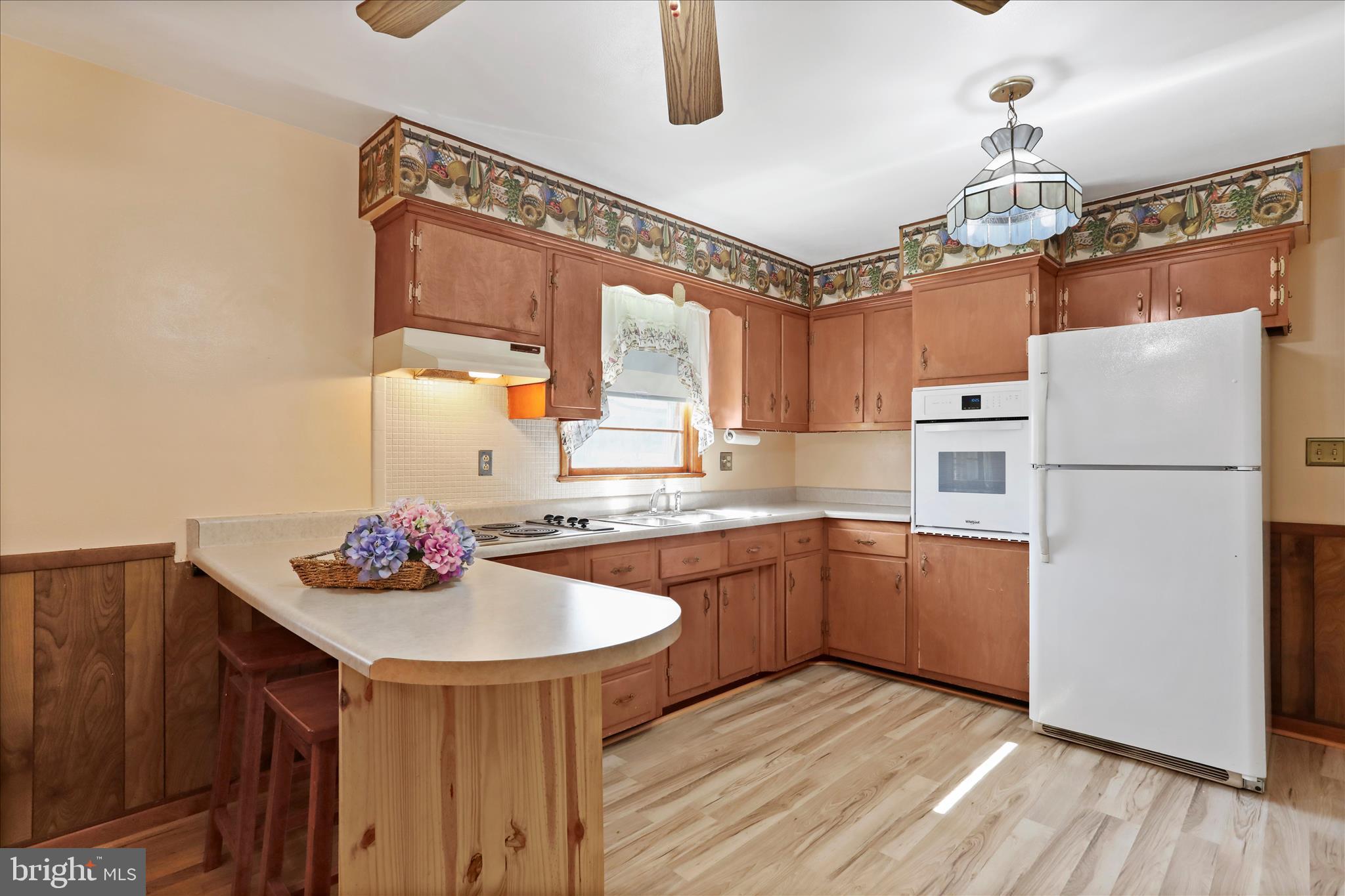 550 Bucks Mill Road Strasburg, VA 22657 - Photo 7 of 57 a kitchen with stainless steel appliances granite countertop a sink stove and refrigerator