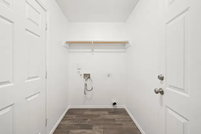 a view of a room with racks on the wall