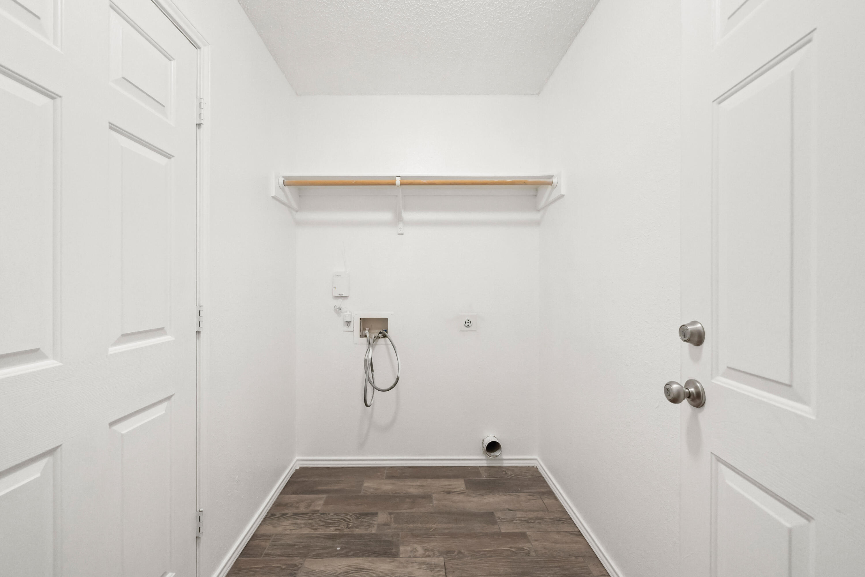 6201 5th Street Lubbock, TX 79416 - Photo 20 of 25 a view of a room with racks on the wall