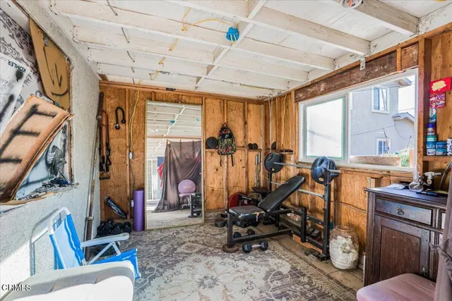a room with furniture a window and a chandelier