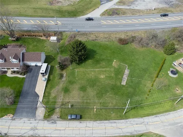 an aerial view of a residential houses