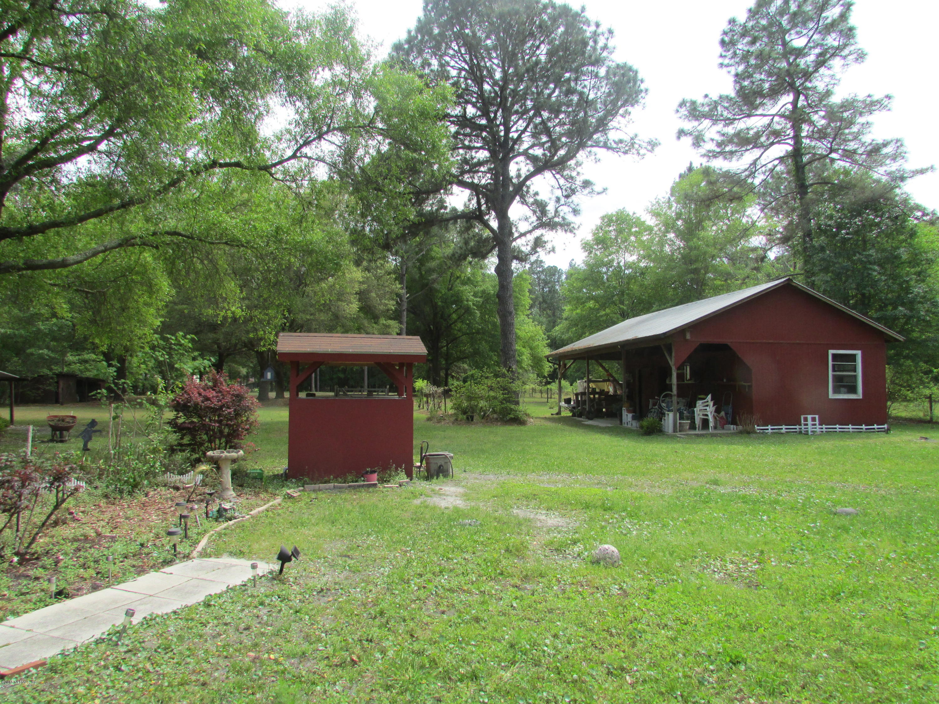 8720 Denny Road Jacksonville, FL 32220 - Photo 21 of 25 Backyard and Barn Storage