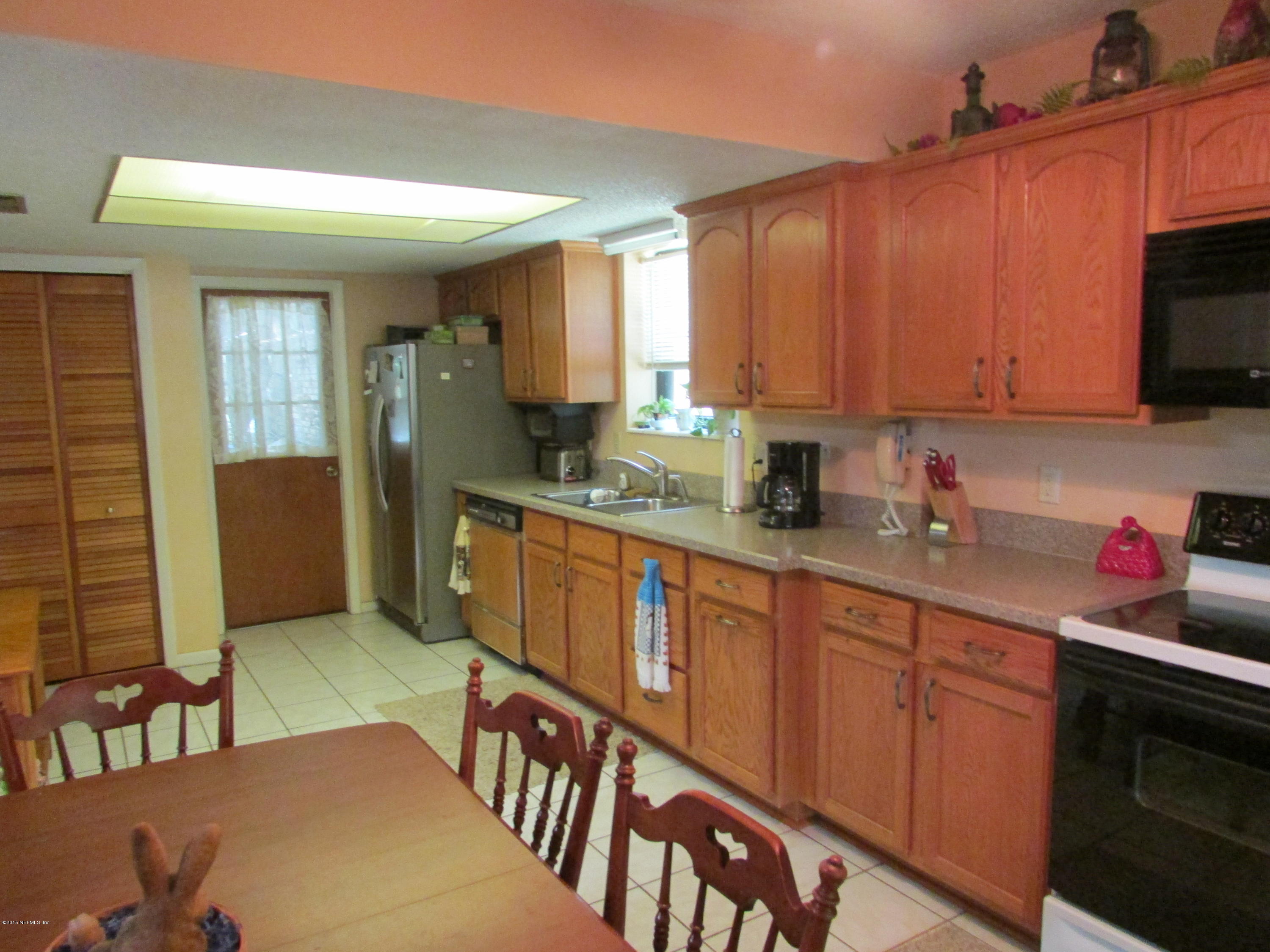 8720 Denny Road Jacksonville, FL 32220 - Photo 3 of 25 Great Counter Space & Cabinets