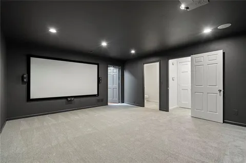 a view of an empty room with windows