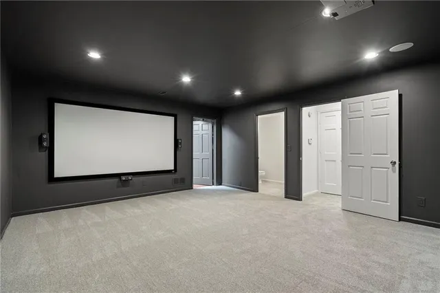 a view of an empty room with windows