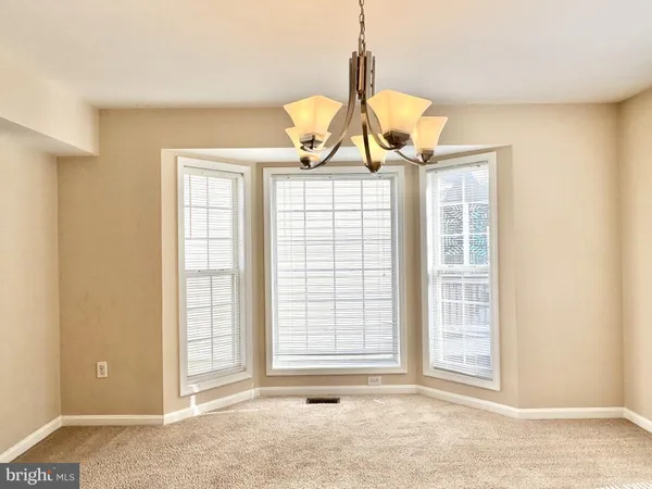 a view of a room with windows