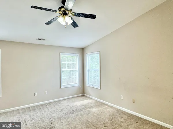 a house with trees in front of it