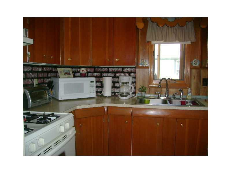 154 Manning Street Warwick, RI 02889 - Photo 14 of 23 Kitchen. Kitchen with washer