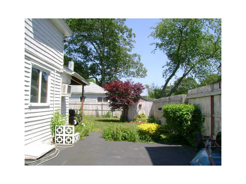 154 Manning Street Warwick, RI 02889 - Photo 2 of 23 Exterior Front. extended driveway in backyard
