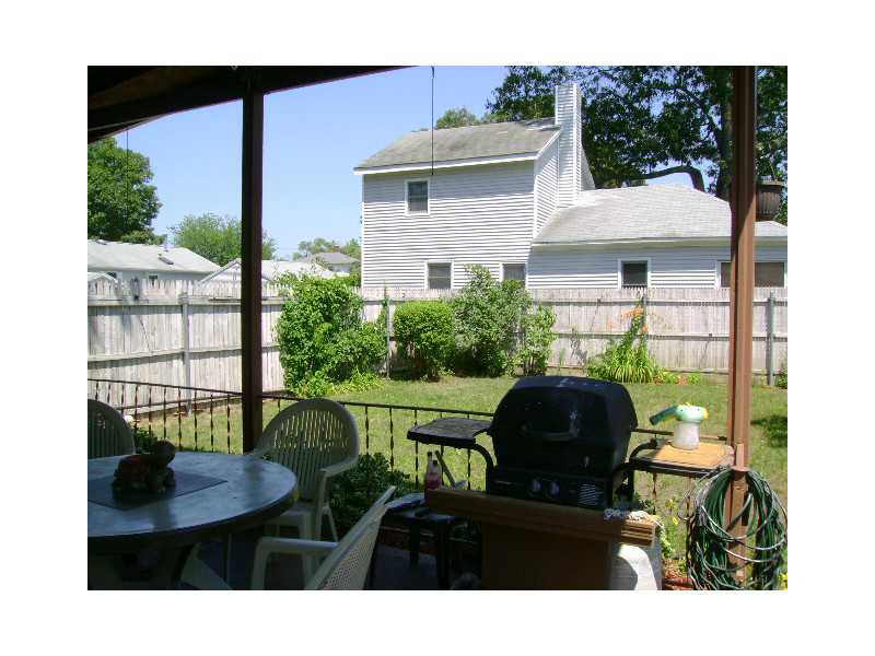 154 Manning Street Warwick, RI 02889 - Photo 4 of 23 Exterior Front. completely fenced in back yard.