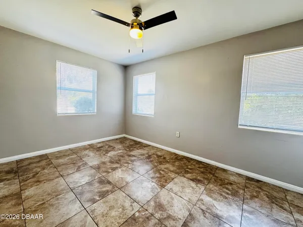 a view of an empty room and window