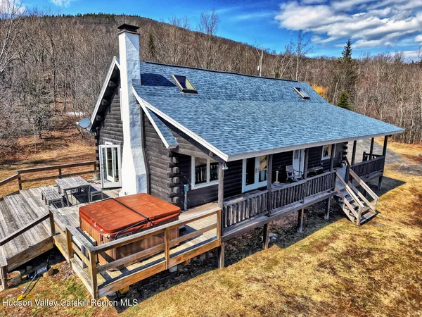 a bird view of a house with a yard