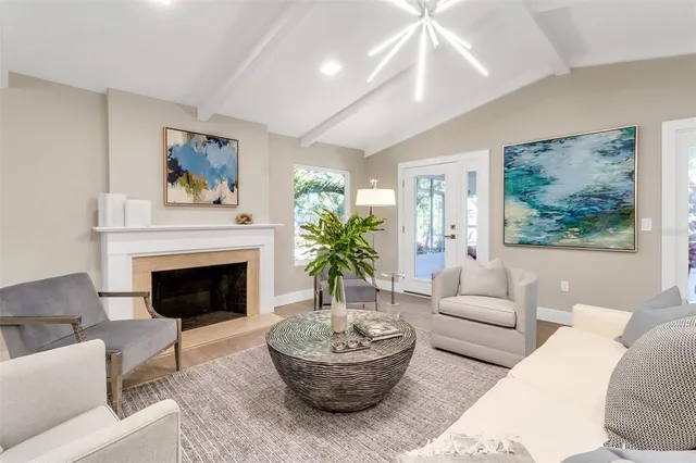 a spacious bedroom with a large bed and a window