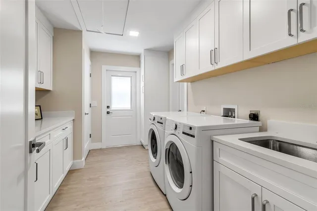an aerial view of a house with outdoor space and street view