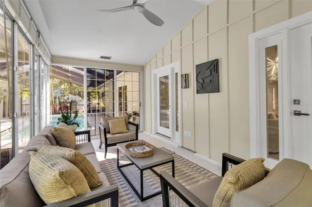 a view of yard with small fountain plants and large trees
