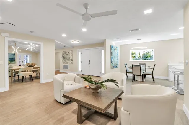 a kitchen with a refrigerator and a sink