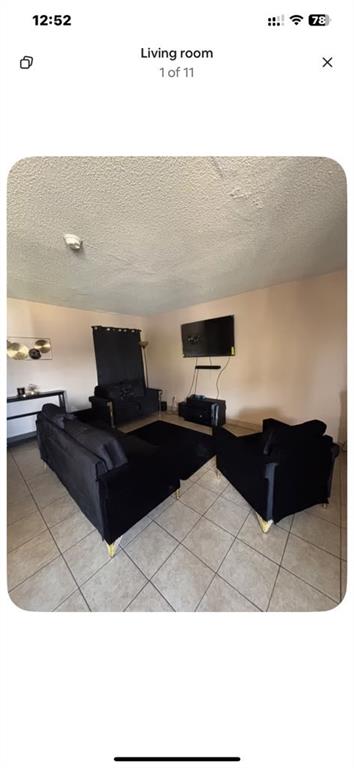 5615 Harvest Hill Road, Unit 2015 Dallas, TX 75230 - Photo 1 of 9 a living room with furniture