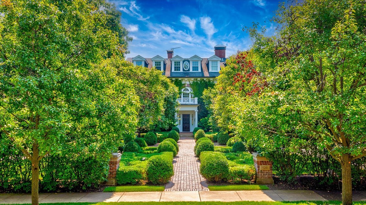 126 Hazel Avenue Glencoe, IL 60022 - Photo 1 of 44 a view of a building with garden