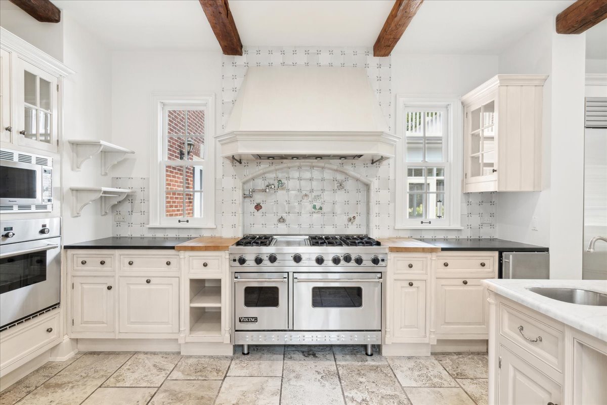 126 Hazel Avenue Glencoe, IL 60022 - Photo 11 of 44 a white stove top oven sitting inside of a kitchen